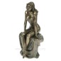 Sculpture en materiaux composite patiné bronze femme nue assise jambe croissée hauteur 20 cm