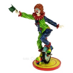 CL47001035  Clown monocycle en résine hauteur 25,7 cm 65,40 €