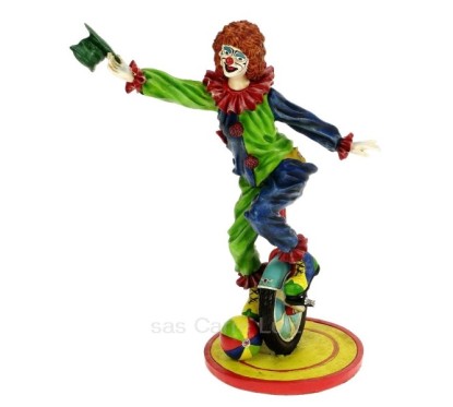 CL47001035  Clown monocycle en résine hauteur 25,7 cm 65,40 €