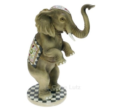 CL47001039  Eléphant de cirque en résine hauteur 32 cm 65,40 €